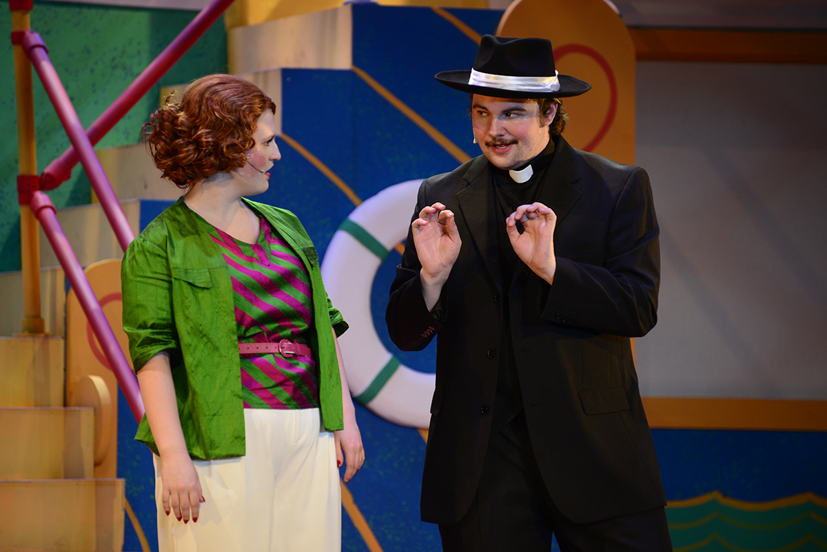Two performers onstage at Shryock Auditorium.