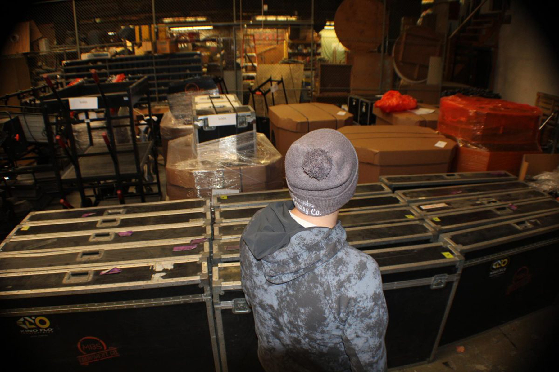 Rice looks over vast media equipment.
