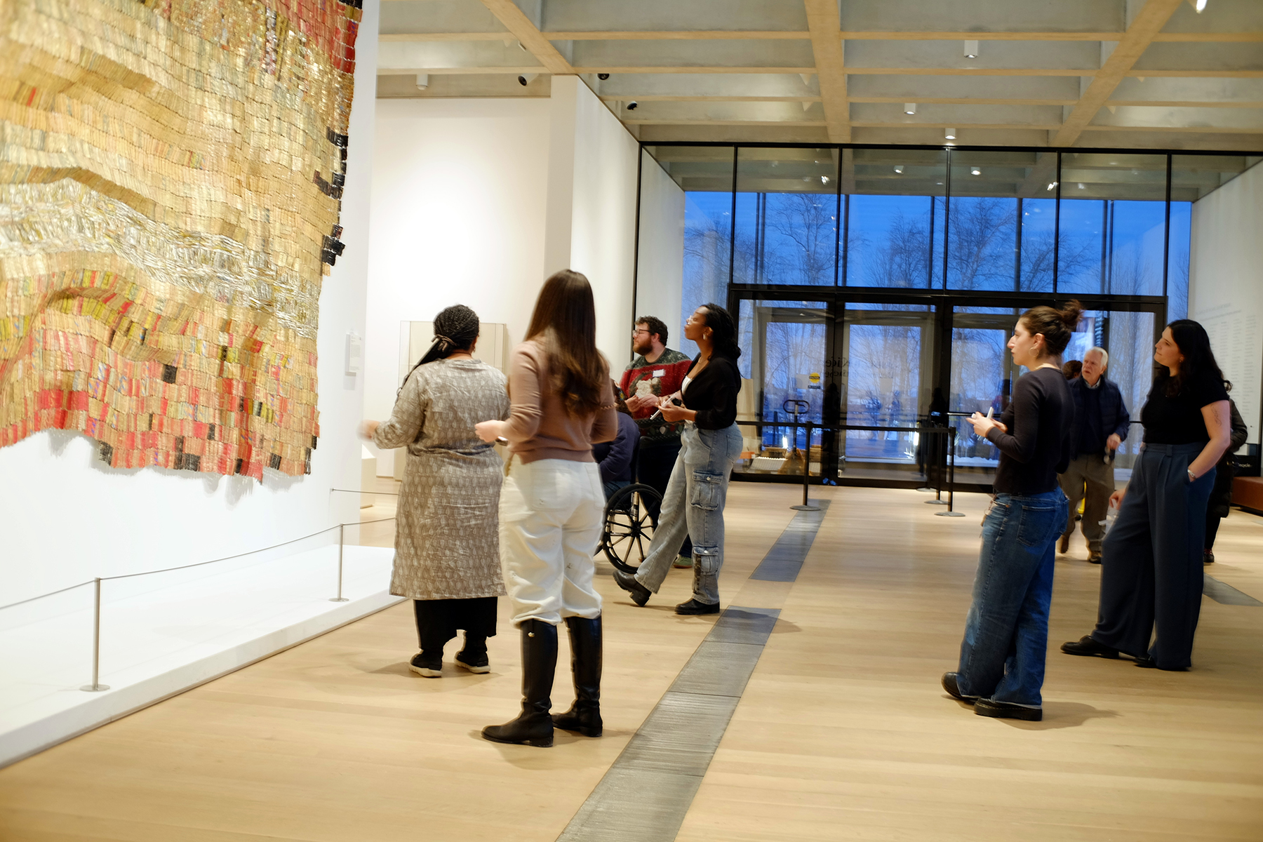 Program participants viewing art pieces.