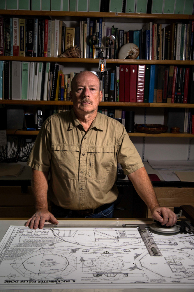 Thad Heckman at the drafting table in his office.