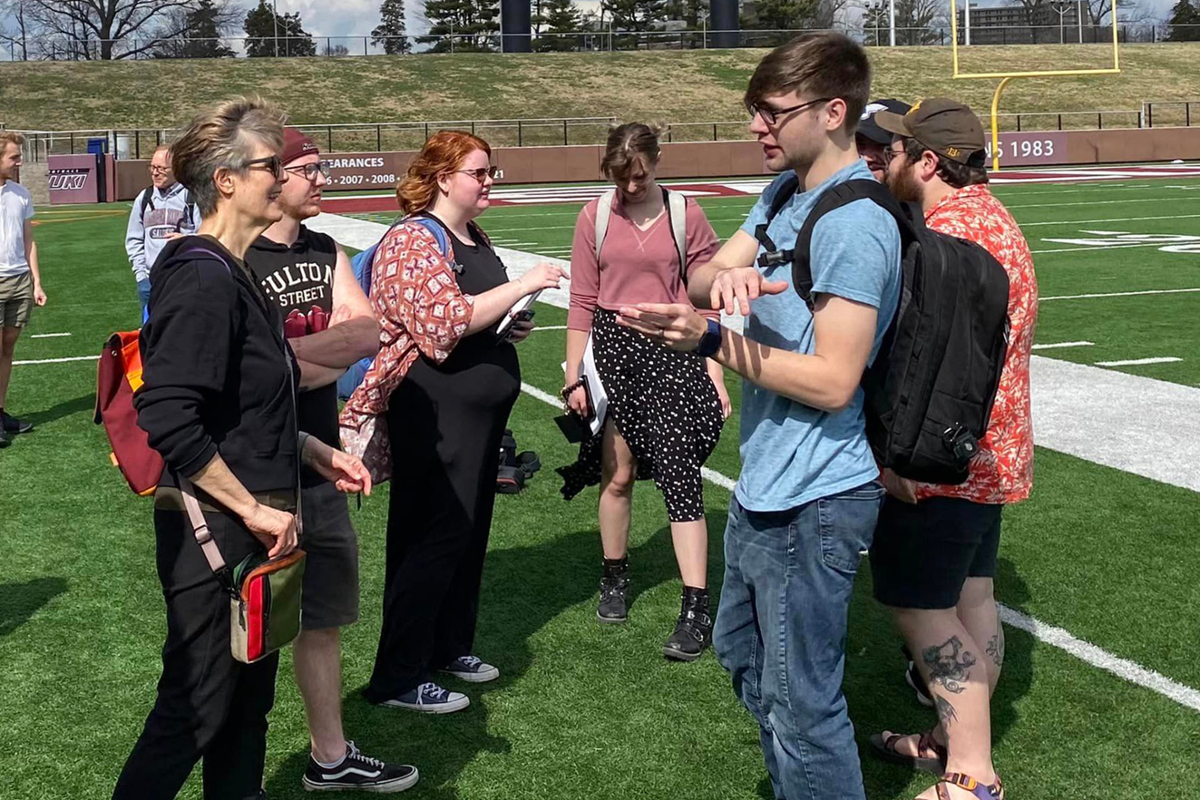 students on football field